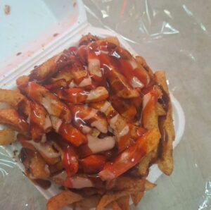 Jay Jay Café Saucy Fries in a Takeaway Container